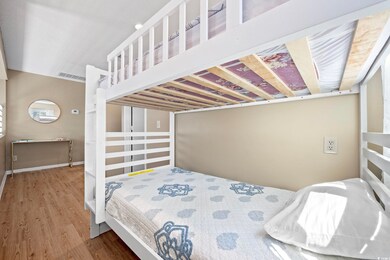 Bedroom featuring hardwood / wood-style flooring