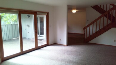 Living Room and Fenced Courtyard