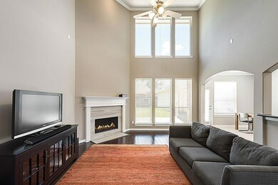 Homeowner installed solar tint on floor-to-ceiling windows to allow ample natural light, yet cut down on your electric bill every month