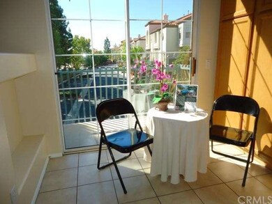 The sunny breakfast nook has pantry cabinets and b