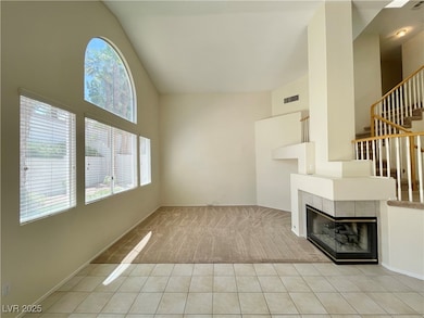 Unfurnished living room with tile patterned floori