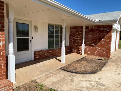 Front doorway to property and covered porch