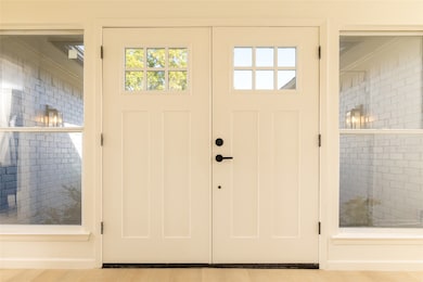 Doorway with wood finished floors
