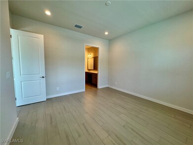 Unfurnished bedroom featuring light hardwood / woo