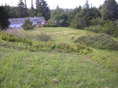over view of lot/ neighbors home