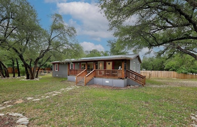 Manufactured / mobile home with a porch, metal ro