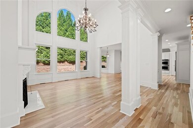 Unfurnished living room with a high end fireplace,