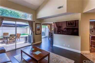 Sliding doors allow for combined indoor/outdoor li