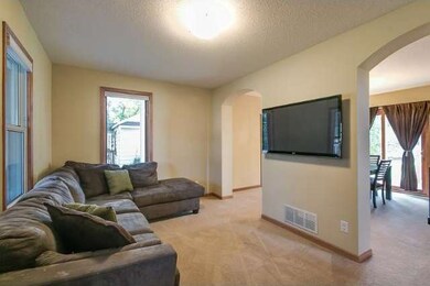 Bright and sunny with large windows. Patio door an