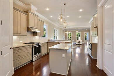 Another view of the kitchen with custom cabinets..