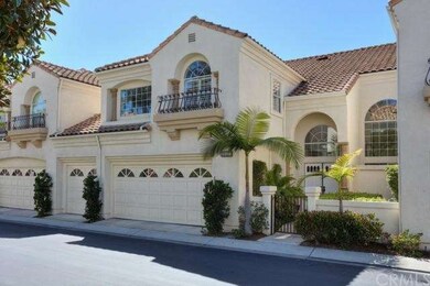 Front of this luxurious townhome with attached 3 c
