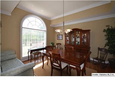 Formal Dining Room with arched windows giving lots