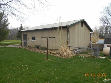 32x24 detached garage with concrete floor, overhea