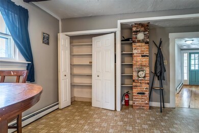 Exposed brick chimney and pantry
