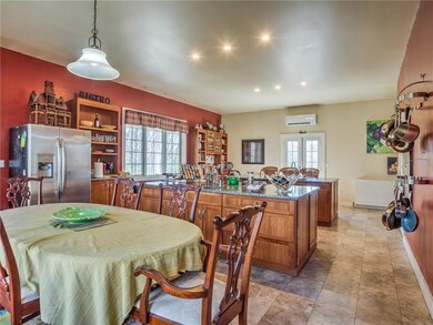 Dining room meets eat-in kitchen in...