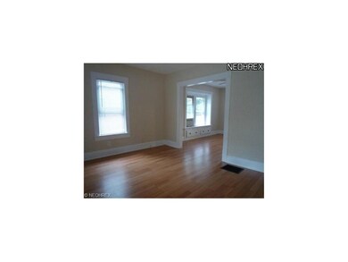 Here we see the living room and the entry to the f