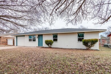 Ranch-style home with a garage
