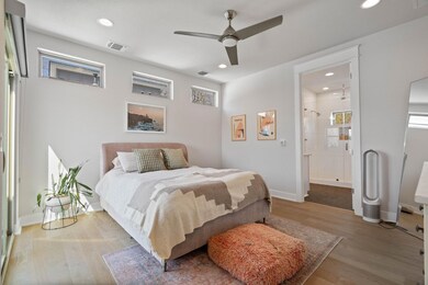 Bedroom featuring light wood-style flooring, rece