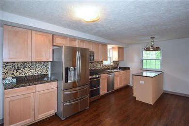 Generous Kitchen Cabinetry & Updated Appliances