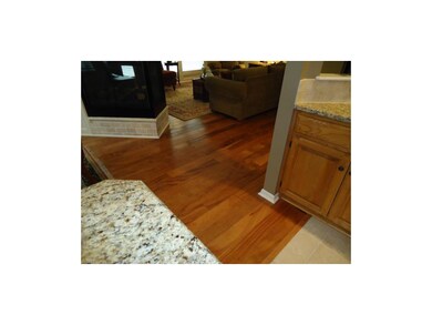 Wood plank floors in Entry, Great Room and Dining 