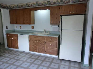 Eat in kitchen with bay window & new vinyl flr