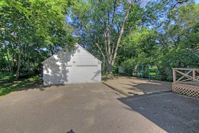This 2 car garage also has an attached workshop and shed.