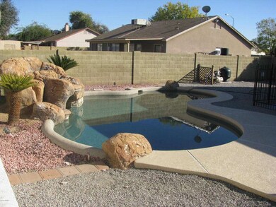 Pool with waterfall feature
