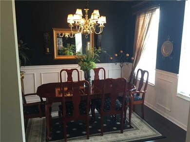 Dining Room. formal dining room opens to front foyer and formal living room