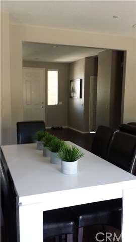 Dining Room is between the Kitchen and Family Room