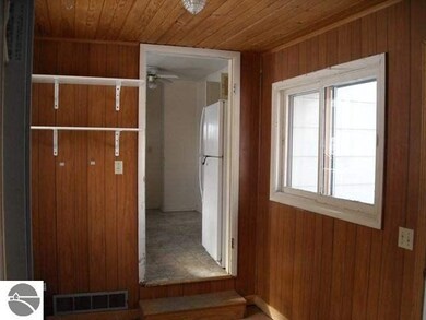 This room is the breezeway, entry and laundry room
