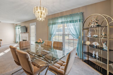 The dining room features large windows on both sides allowing tons of natural light in.