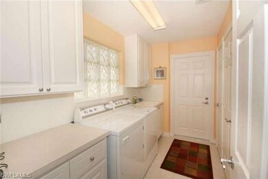 Laundry Room with storage and plenty of counter space. Walk thro