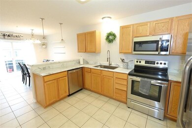 Kitchen with view of walk out patio