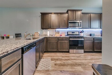 Spacious kitchen with gas stove