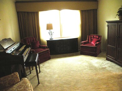 Great living room that would make wonderful home office.