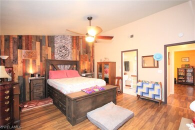 Built in custom designed wood wall in the Master Bedroom
