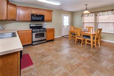 Kitchen with breakfast area.