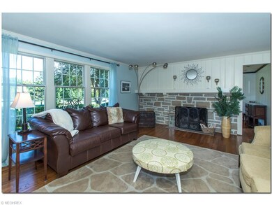 Spacious Living Room with Hardwood Floors and     