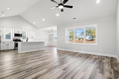 Unfurnished living room with plenty of natural lig