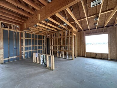 Misc room featuring unfinished concrete floors