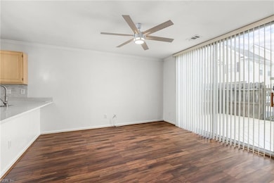Den off kitchen and back deck.