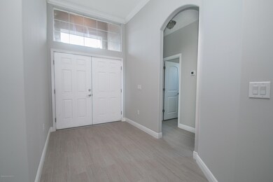 Front Entry and Hall to Bedrooms