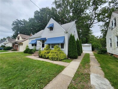 View of front of property featuring a front yard a