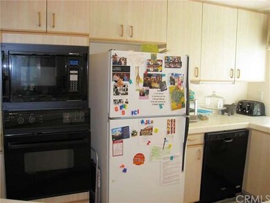 Built in electric oven, microwave and dishwasher. 