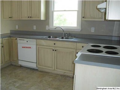 The kitchen has a dining area, a built-in dishwash