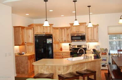 Kitchen is open to living and dining
