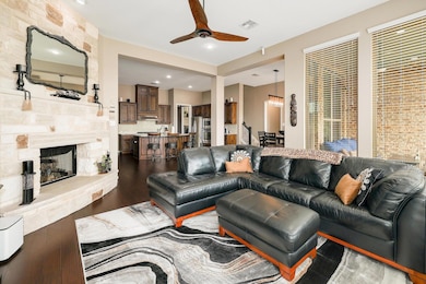 Living room featuring wood finished floors, ceili