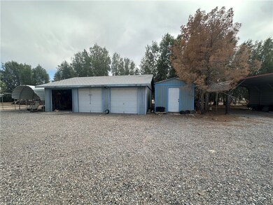 3 Car Garage with Shed