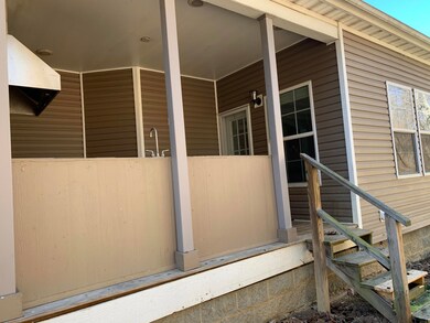 BACK PORCH WITH BARBEQUE AREA