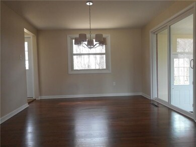 Full dining room with sliding door off to 3 season